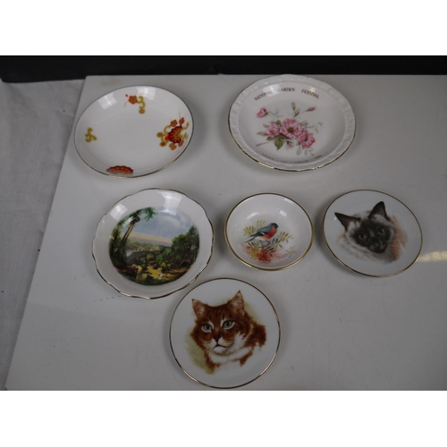 546 - A large collection of mixed miniature ceramics to include Wade Whimsies, motto ware and Spode dishes... 