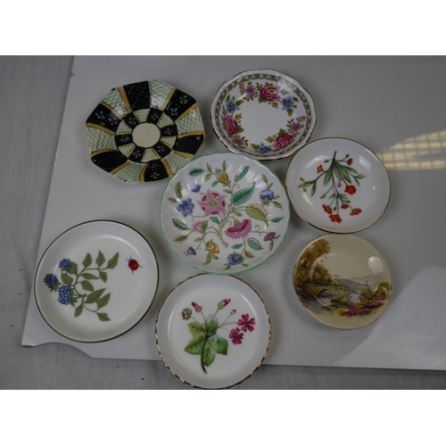 546 - A large collection of mixed miniature ceramics to include Wade Whimsies, motto ware and Spode dishes... 