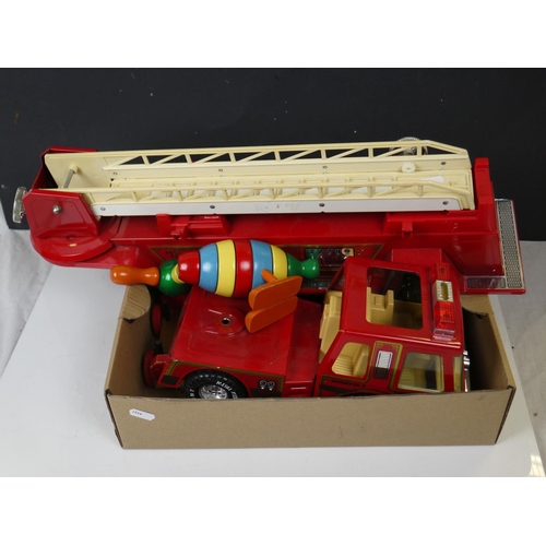 550 - A vintage wooden Brio toy train together with a large metal Nylint toy fire engine.