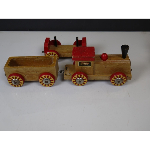 550 - A vintage wooden Brio toy train together with a large metal Nylint toy fire engine.