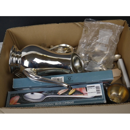 556 - A box of mixed silver plated items to include cutlery and a water jug.