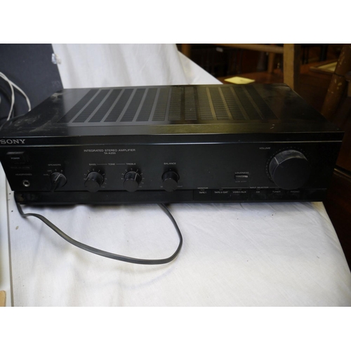 557 - A Hi-Fi separates stereo system to include a Sony amplifier model TA-200, Pioneer CD Player CT-880, ... 