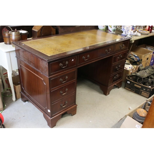 680 - George III style Mahogany twin pedestal desk with brown inset leather top and an arrangement of nine... 