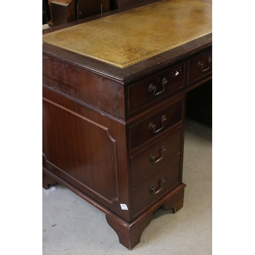 680 - George III style Mahogany twin pedestal desk with brown inset leather top and an arrangement of nine... 