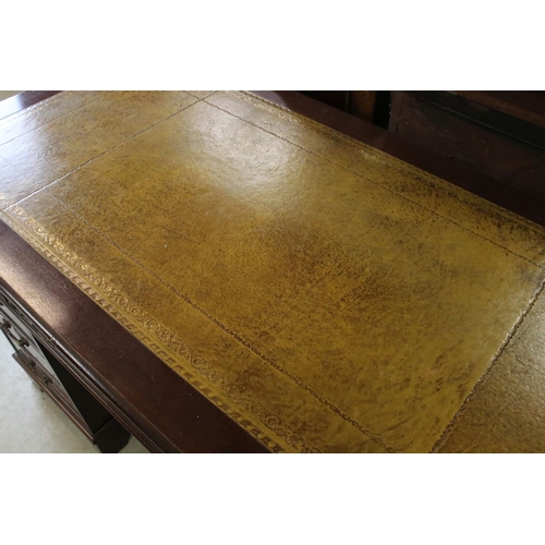 680 - George III style Mahogany twin pedestal desk with brown inset leather top and an arrangement of nine... 