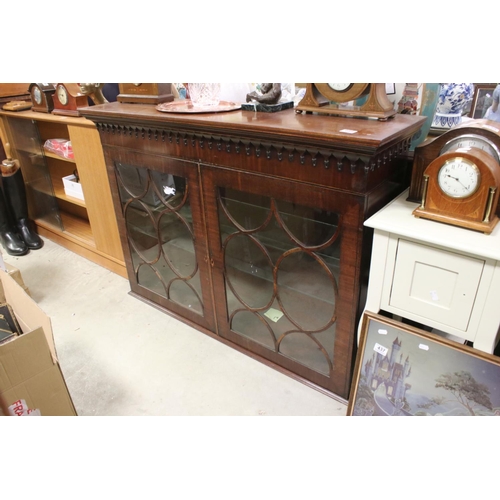 684 - Mahogany cabinet with two astragel glazed doors, 130cms long x 91cms high.
Part of an extensive coll... 