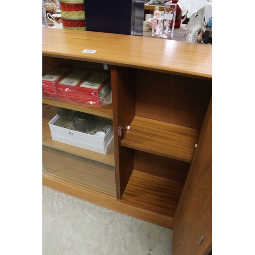 685 - Retro Mid 20th century Herbert Gibbs Teak Bookcase, with two sliding glass doors and enclosed bookca... 