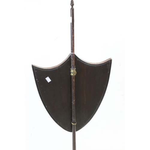 689 - 19th century mahogany and box strung pole screen, with shield shaped screen inset with hand stitched... 