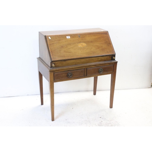 690 - Edwardian Inlaid Mahogany Bureau, the fall front with fitted interior, over two drawers and raised o... 