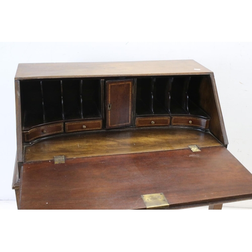 690 - Edwardian Inlaid Mahogany Bureau, the fall front with fitted interior, over two drawers and raised o... 