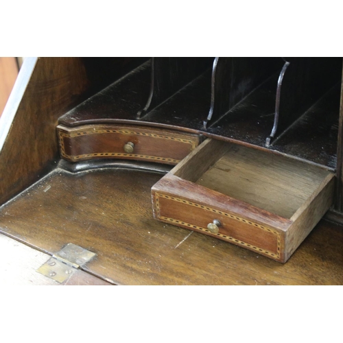 690 - Edwardian Inlaid Mahogany Bureau, the fall front with fitted interior, over two drawers and raised o... 