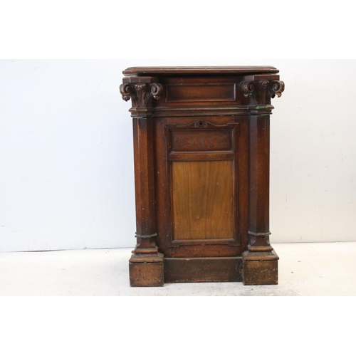 699 - Early 20th century Oak Cabinet, with lift lid and hinged fall front, carved Corinthian column suppor... 