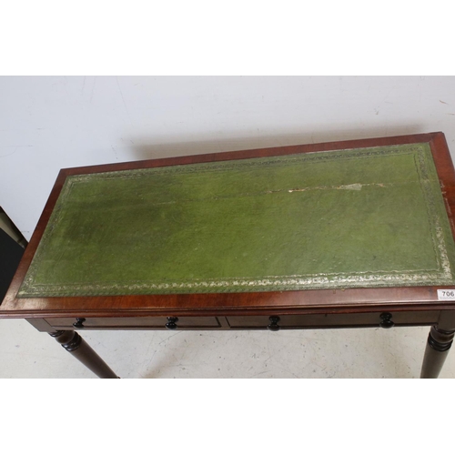 706 - Victorian mahogany writing table with two drawers, turned legs and castors, approx 117cm wide