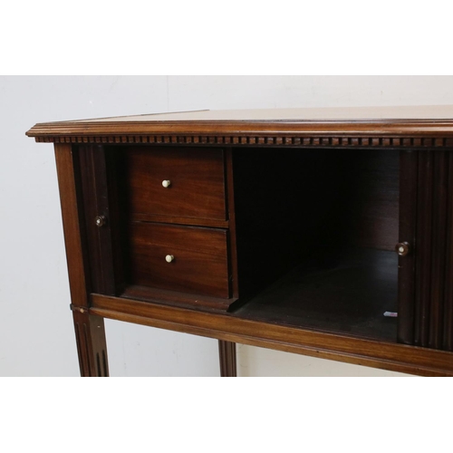 710 - George III mahogany side cabinet, circa 1800, the rectangular top with dentil apron above a pair of ... 