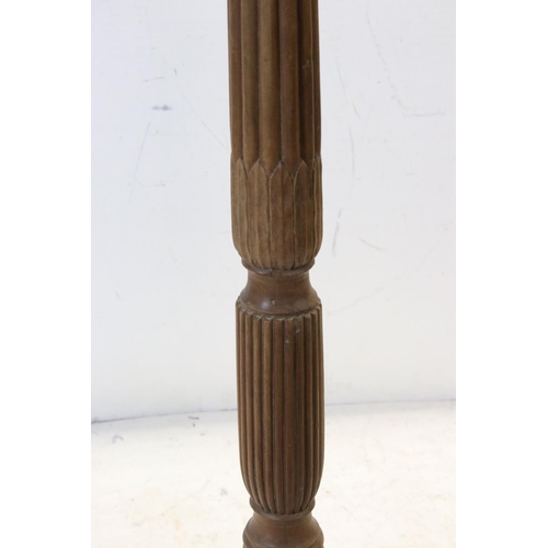 714 - 19th century style Walnut Torchere with reeded column and three splayed legs, 123cms high