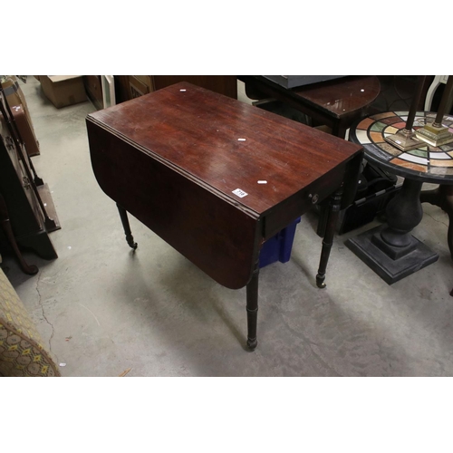 718 - 19th century Mahogany Pembroke Table with drawer to end, raised on turned legs and castors, 94cms lo... 