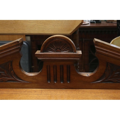 721 - Victorian Mahogany Sideboard with two drawers and two cupboard doors, the doors with panels carved w... 