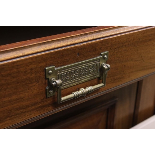 721 - Victorian Mahogany Sideboard with two drawers and two cupboard doors, the doors with panels carved w... 