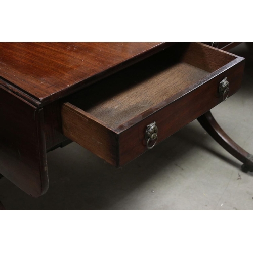 737 - Regency mahogany and boxwood strung sofa table, circa 1820, the rectangular top above two frieze dra... 