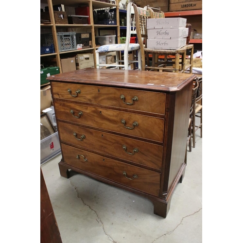 739 - George III Mahogany Chest of Four Long Drawers, with canted fluted corners and raised on bracket fee... 