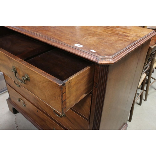 739 - George III Mahogany Chest of Four Long Drawers, with canted fluted corners and raised on bracket fee... 