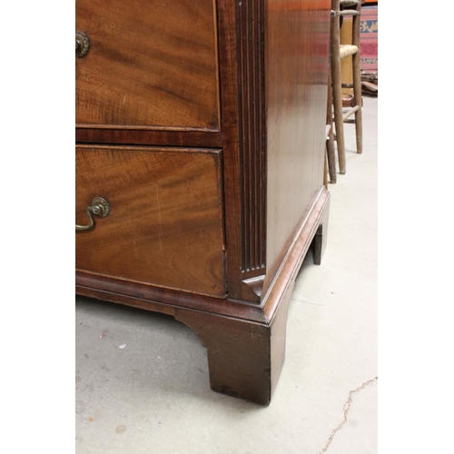 739 - George III Mahogany Chest of Four Long Drawers, with canted fluted corners and raised on bracket fee... 