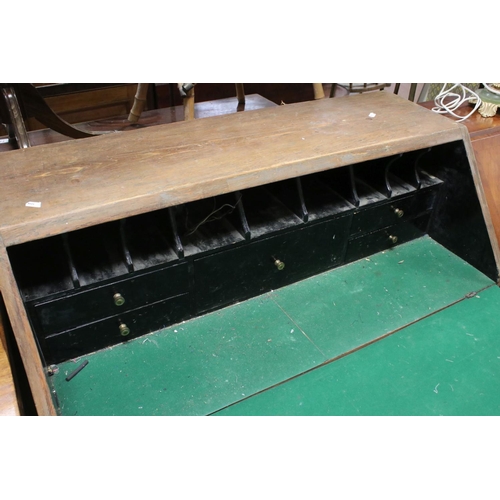 756 - George III Oak Bureau, the fall front opening to a fitted interior (modified) over four long drawers... 