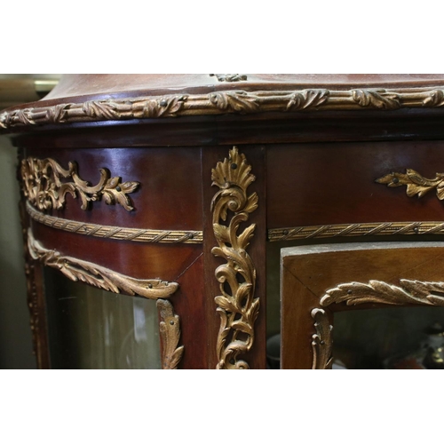 763 - Louis XV style Kingwood and Gilt Metal Vitrine of serpentine outline, with Vernis Martin style panel... 