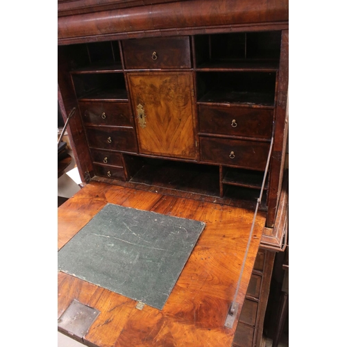 766 - 18th century Walnut Escritoire, the hinged fall front enclosing a fitted interior, over two short an... 