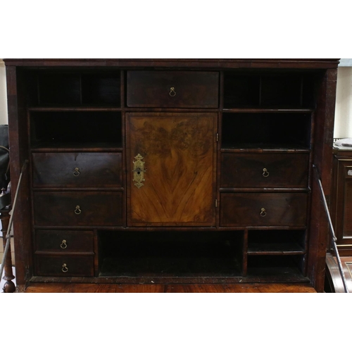 766 - 18th century Walnut Escritoire, the hinged fall front enclosing a fitted interior, over two short an... 