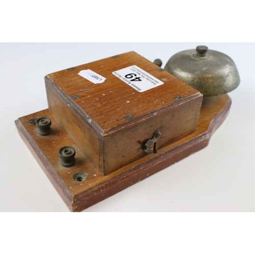 49 - A vintage wooden cased bell.