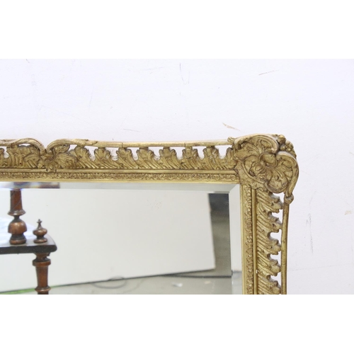 767 - Gilt gesso rectangular wall mirror with bevelled plate, 82cms x 68cms together with Walnut corner wh... 