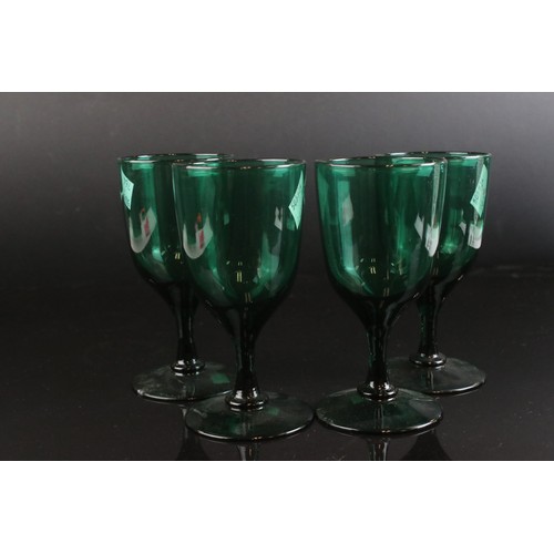 66 - A box of vintage glassware to include baseless spirit glasses and vases. Part of an extensive collec... 