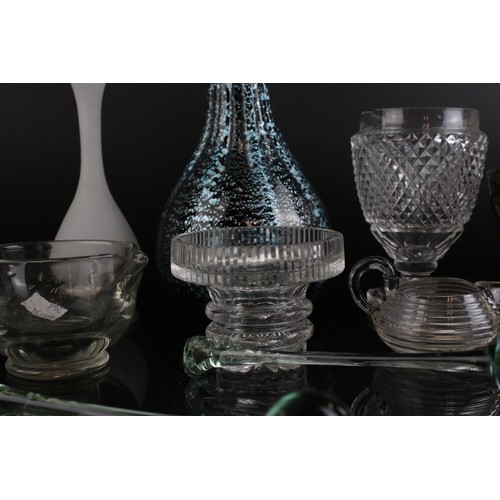 66 - A box of vintage glassware to include baseless spirit glasses and vases. Part of an extensive collec... 