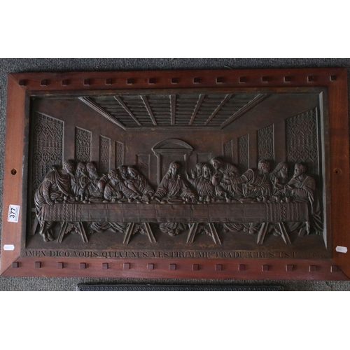 377 - A large wooden framed metal plaque of The Last Supper together with a similar of smaller dimensions.