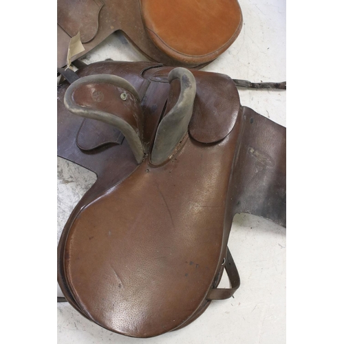 396 - Two brown leather ladies side saddles one marked Wilton champion.