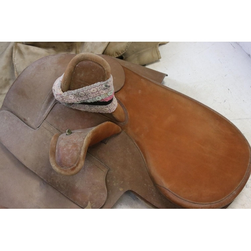 396 - Two brown leather ladies side saddles one marked Wilton champion.