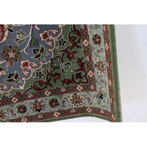 658 - Persian Green and Blue Ground Rug, 150cms x 101cms