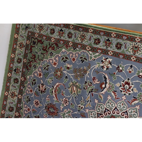 658 - Persian Green and Blue Ground Rug, 150cms x 101cms