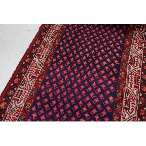 659 - Persian Red Ground Rug, 300cms x 100cms