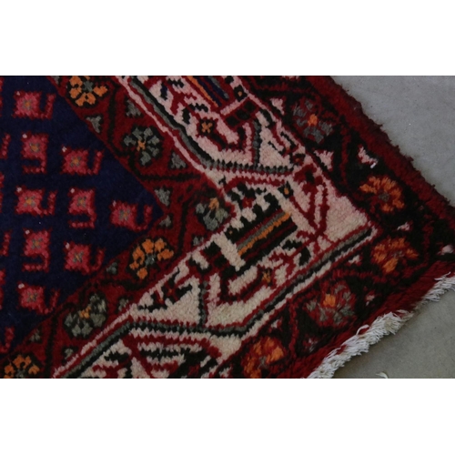 659 - Persian Red Ground Rug, 300cms x 100cms