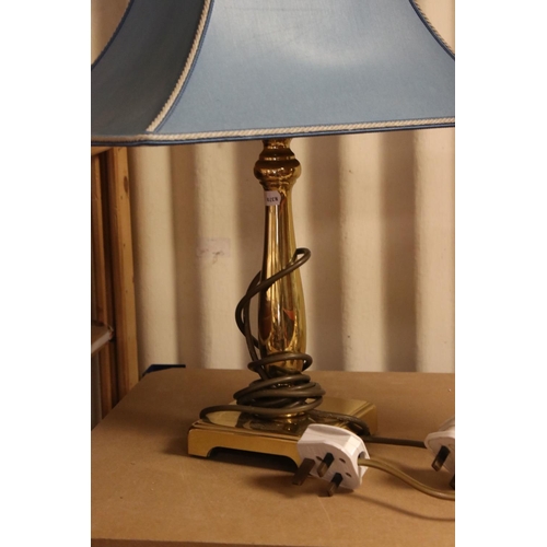 526 - Three brass table lamps to include a large Corinthian column example.