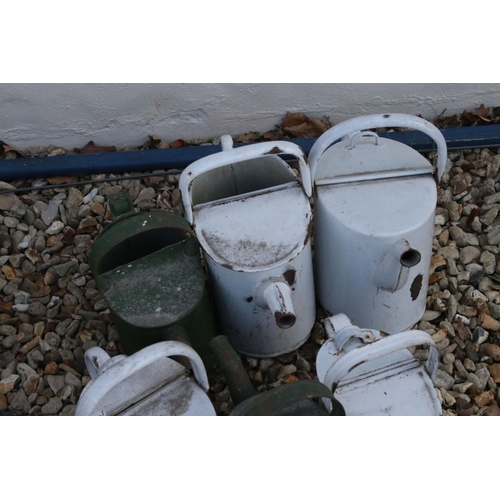 624 - A collection of six vintage painted watering cans