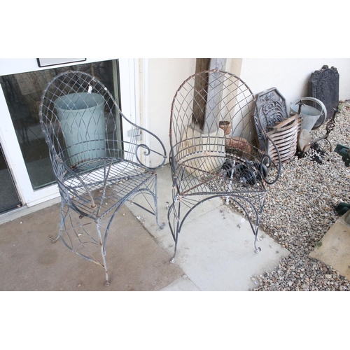 627 - Two vintage metal folding garden chairs.