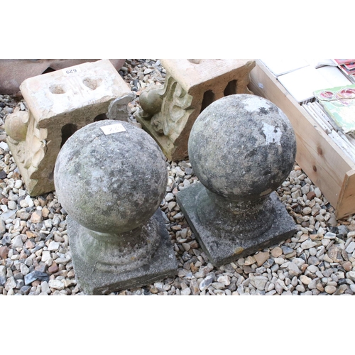 628 - Pair of composite stone finial balls, approx 35cm high