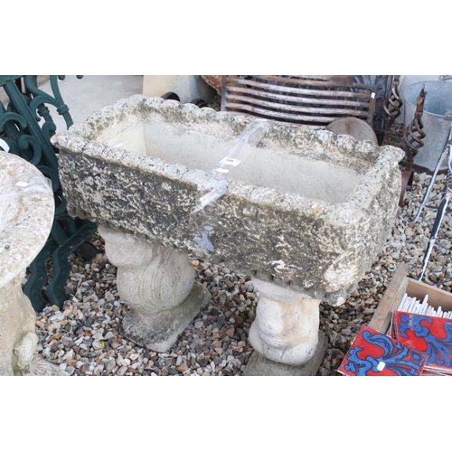 634 - A large rectangle reconstituted stone garden urn on legs.