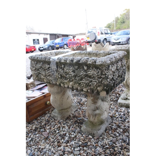 634 - A large rectangle reconstituted stone garden urn on legs.