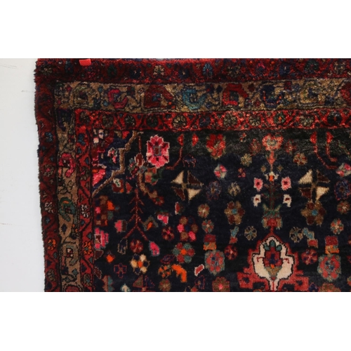 660 - Persian Red Ground Rug, 317cms x 130cms