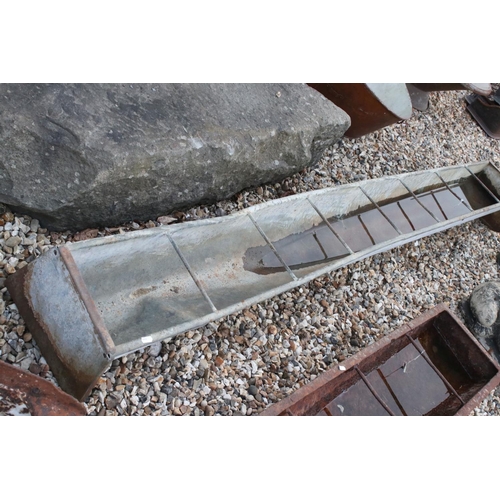 615 - A vintage galvanised free standing water / food trough, measures approx 244cm