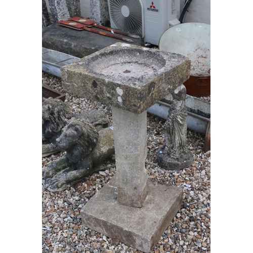 619 - A mid century stone bird bath, stands approx 82cm in height